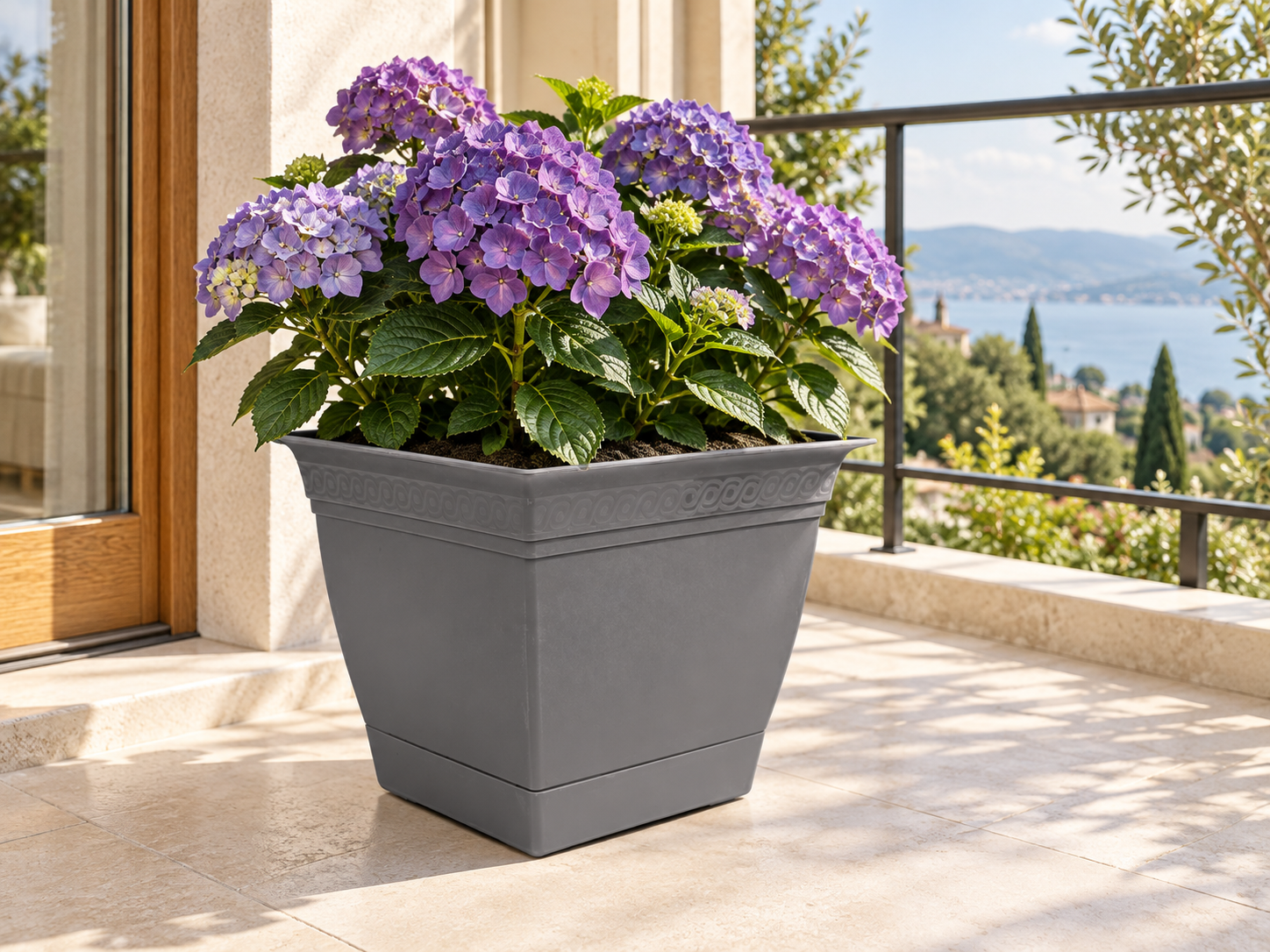 BURDEM Flowerpot Violet 4 planted with purple hydrangea on a contemporary European balcony